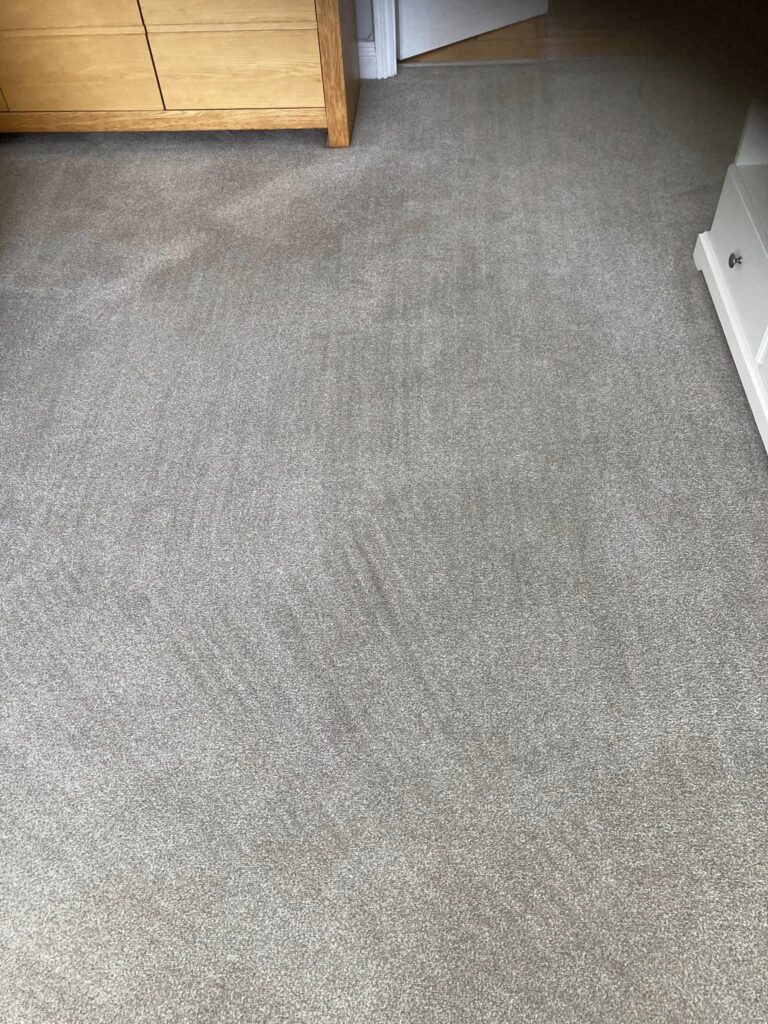 Stained carpet after cleaning